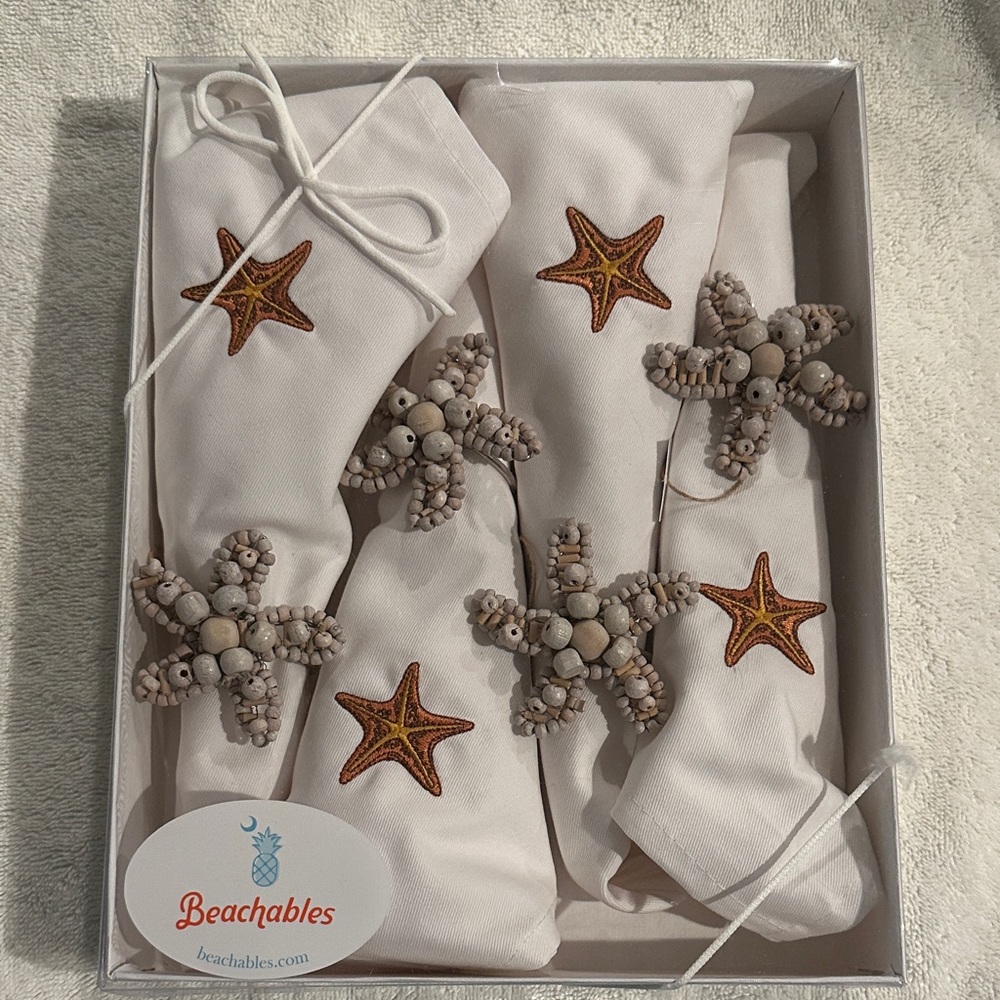 Set of 4‎ cloth napkins and ring napkin holder by Rightside Design.  Starfish